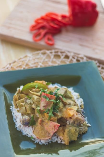 Illustrative vegetable curry served with rice
