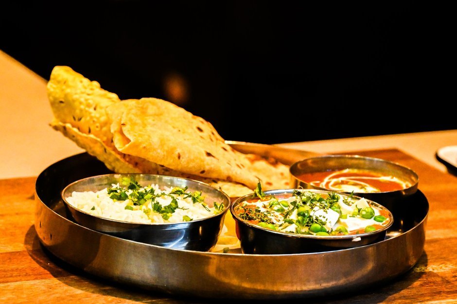 North Indian thali with naan, dal, and paneer