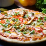 Tandoori chicken flatbread pizza with melted cheese and fresh cilantro