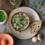 Rich matar mushroom curry with green peas in a velvety cashew gravy