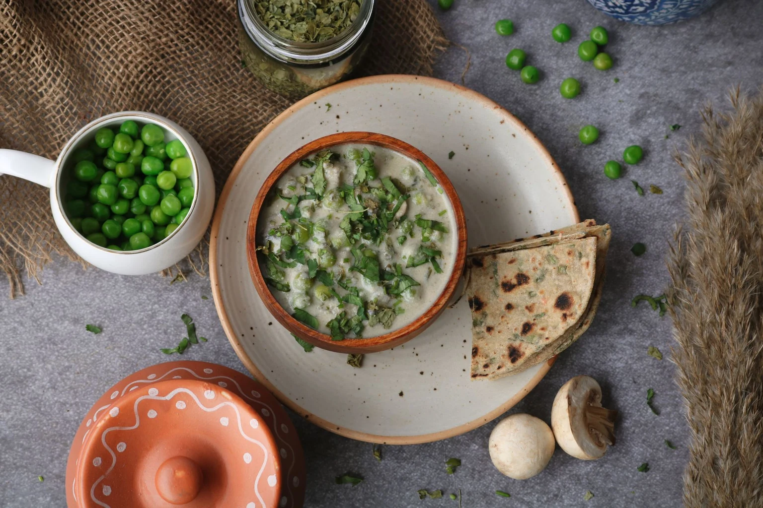 Rich matar mushroom curry with green peas in a velvety cashew gravy