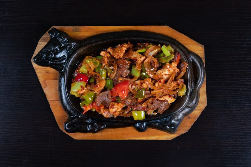 Vibrant paneer jalfrezi stir-fry with colorful bell peppers in a skillet