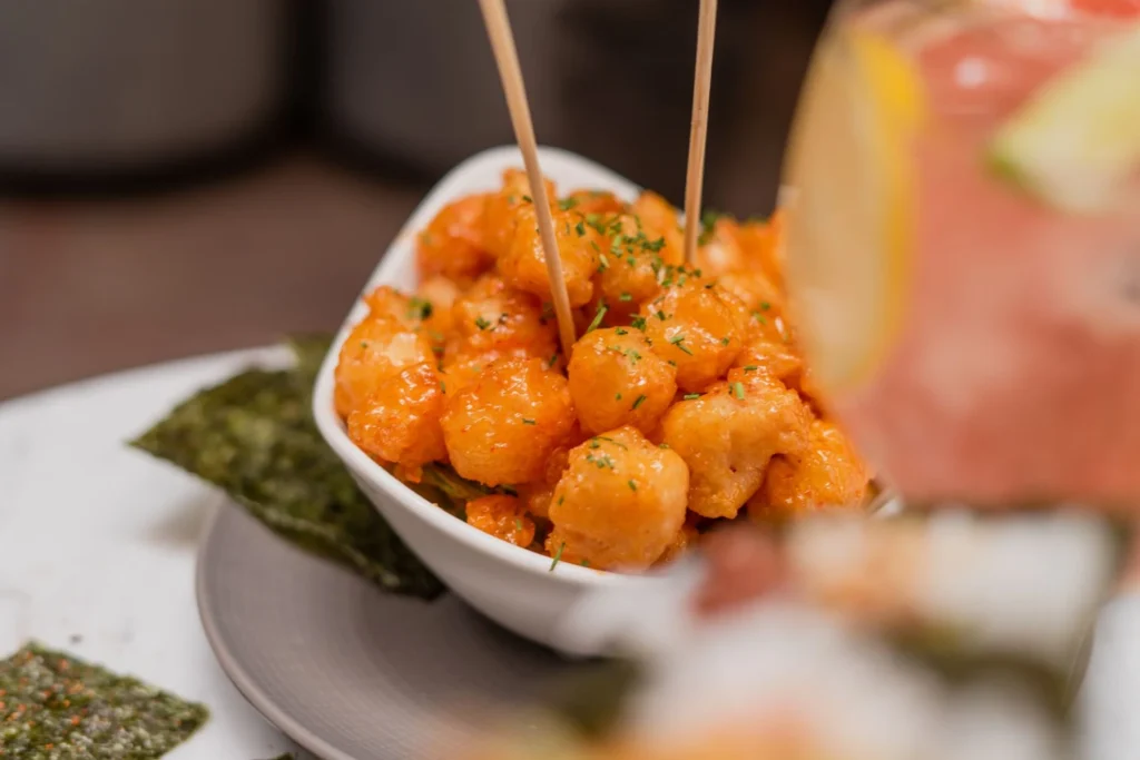 Close-up of a glazed cocktail turkey meatball ready to serve